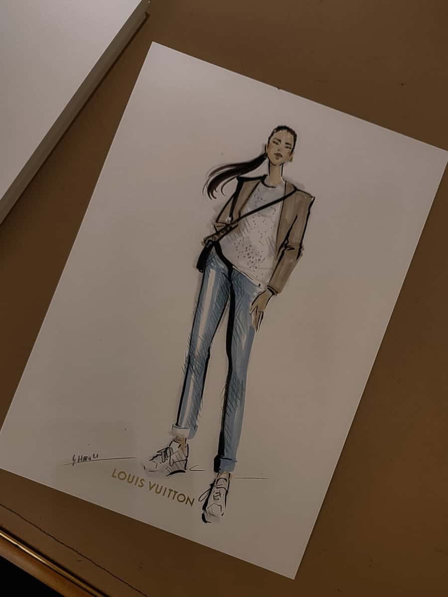 A photo of a fashion illustration done as a live event sketch of a guest at a Louis Vuitton in store event in Sandton by artist Hanli